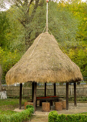 an old straw hut in the ethnographic settlement of Etara Bulgaria