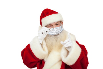 Weihnachtsmann mit Mundschutz und erhobenem Finger