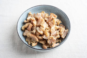 A bowl of lard residue