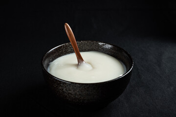 A bowl of lard that has just begun to solidify