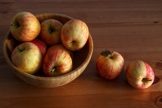 Still life with apples of the Gala variety.