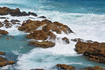 waves crashing on rocks