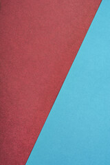 Fototapeta na wymiar Blue and pink pastel color paper geometric flat lay background