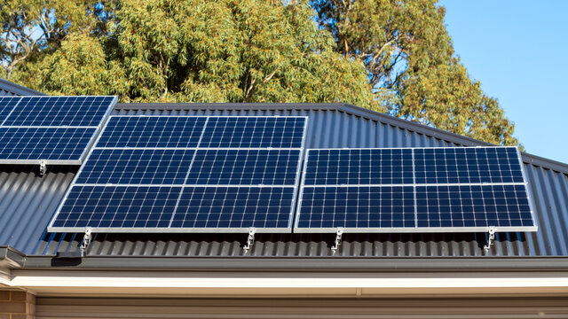 New Solar Panels Installed On Metal Sheet Roof Of The House In South Australia