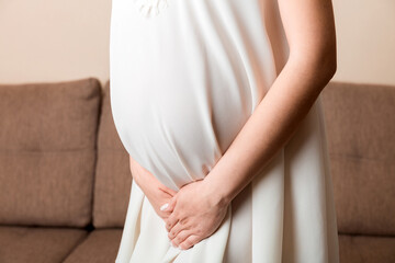 urinary incontinence during pregnancy. Abdominal pain during pregnancy. Maternity healthcare concept
