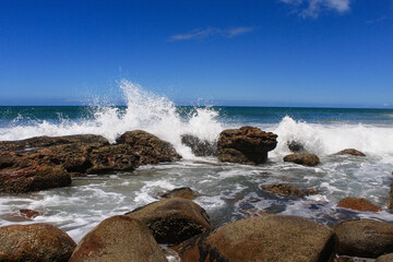waves crashing on rocks