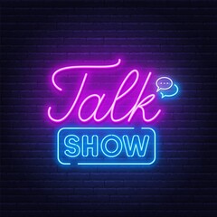 Talk show neon sign on brick wall background .
