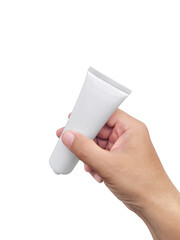 Hand holding Cosmetic plastic tube isolated on white background