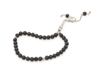 Turkish black rosary (Tespih) on the white background.