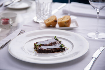 Beefsteak specialty prepared in olive oil with mashed potatoes