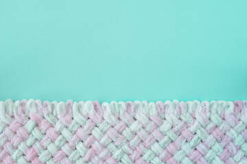 Blue and pink knitting texture background, warm blanket.