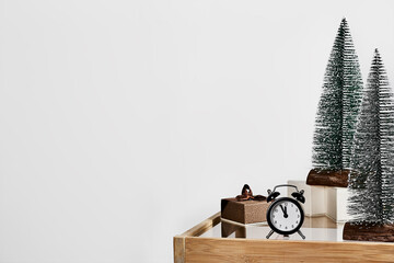 Christmas composition with clock, christmas tree and gifts on for your design. Happy new year and...