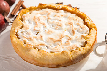 Pear delicious pie and coffee, homemade pastry with cinnamon, sweet dessert for breakfast. Copy space.