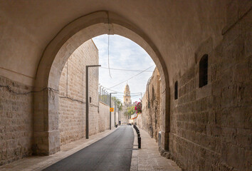 The Armenian Patriarchate Street passing through the Armenian quarter and the top of the King David Tomb in the old city of Jerusalem, Israel