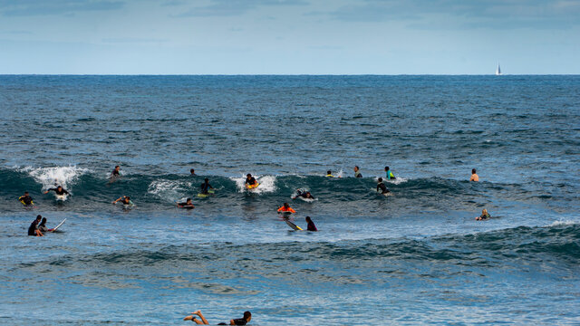 surfing on the beach of la cicer in Las Plamas de GRan Canaria