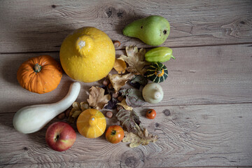 Vegetables and fruits on a wooden background