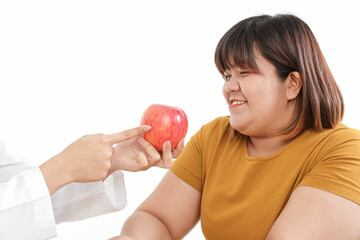 Doctors recommend a healthy diet to overweight patients to help them lose weight. Healthy eating concept