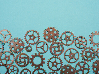 copper various cogs on a blue background