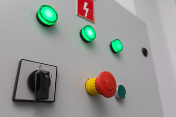 Emergency stop button and other electronic buttons in manufacturing facility