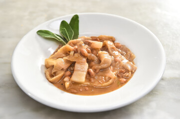 typical soup from Italy called Pasta e fagioli with pasta handmade