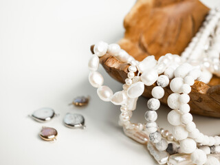 Beads from semi-precious stones, pearls and mother-of-pearl