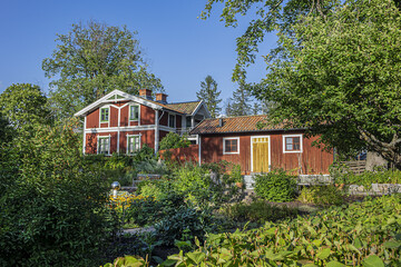Traditional architecture of old Swedish building at Djurgarden island, historic recreational area. Stockholm, Sweden.