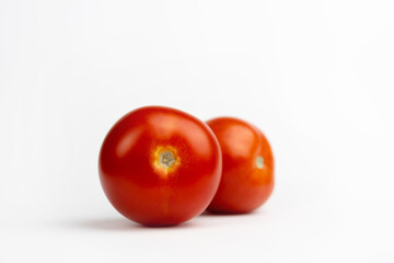 red tomatoes on white background