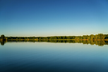 Lake with a forest on the opposite shore