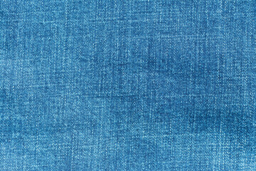 Blue color denim jeans clothes textured background