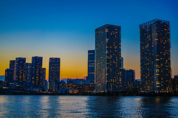 Obraz premium 東京都中央区の高層マンション群と夕景