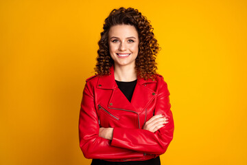 Close-up portrait of her she nice-looking cheerful content businesswoman wavy-haired girl folded arms isolated on bright yellow color background