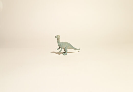 toy dinosaur, gray carnosaurus on a white background