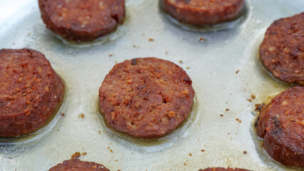 close-up pan fried sausage