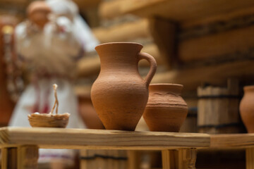 a pitcher of clay on the table