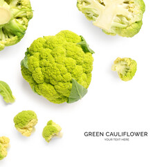 Creative layout made of green cauliflower on the white background. Flat lay. Food concept. Macro ...