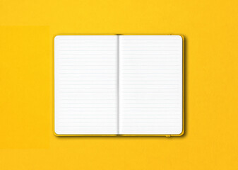 Yellow open lined notebook isolated on colorful background