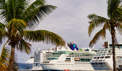 Huge and modern cruiseships or cruise ship liners line up in port of Nassau, Bahamas during...
