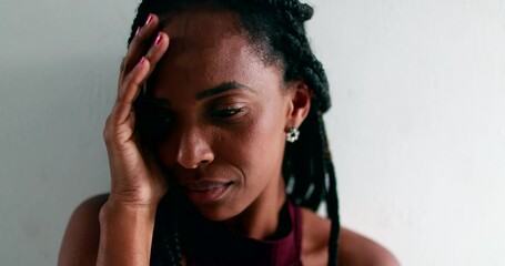 Worried black woman feeling anguish. anxious African female