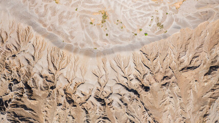 Aerial top view Patterns surface on the earth's, Left by water