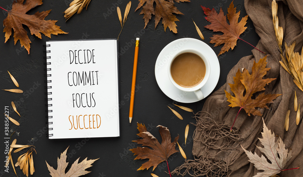 Wall mural notepad with words decide, commit and succeed, black autumn background