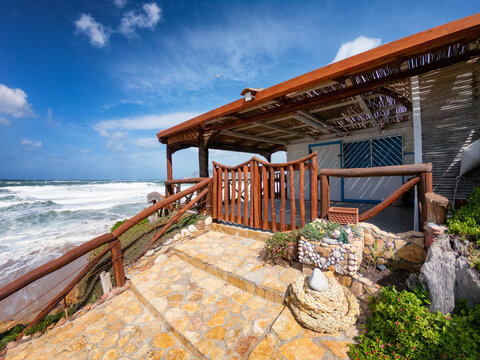 Little bar on the beach with sea view. Nice and tiny pub near the seaside. Small restaurant close to a wonderful blue sea in the west coast of Sardinia (Gonnesa). Rustic house alongside the sand.