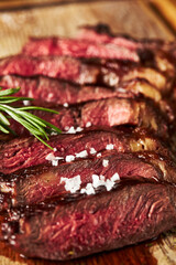 Close up of grilled Medium Rare Ribeye steak with salt cristals