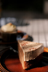 chocolate cake on a plate, soft focus