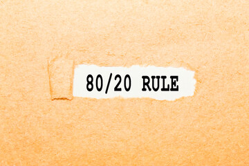 text 80 20 RULE on a torn piece of paper, business concept