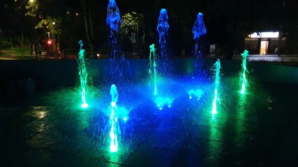 Colorful illuminated city fountain in Gdynia, Poland