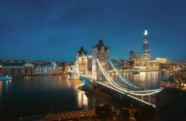 Aerial view to the Tower Bridge and skyline of London, UK