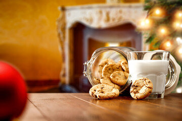 Fototapeta na wymiar chrismtas cookies on desk and fireplace 