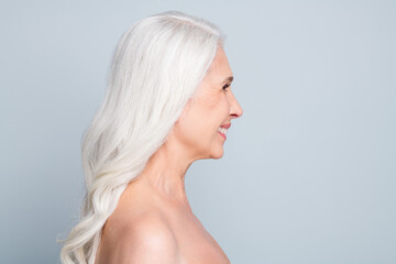Closeup profile photo of beautiful naked aged lady visit spa salon procedures isolated grey color...