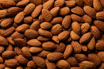 Texture background of almonds. Healthy eating. Top view. Food background.