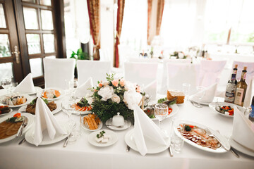 Interior of a restaurant prepared for wedding ceremony
